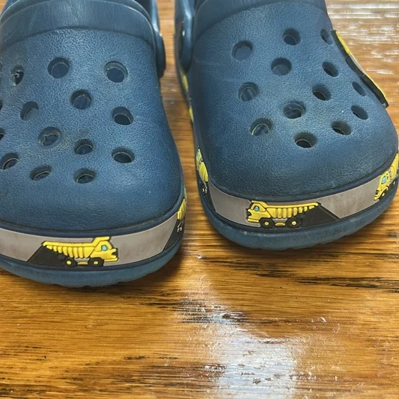 Folhaoth blue rubber open back clogs with yellow excavator on sides.  Toddler 8. - Picture 2 of 10